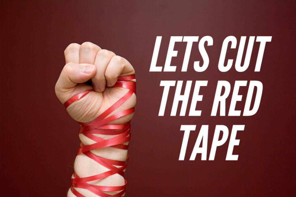 A hand wrapped in red tape
