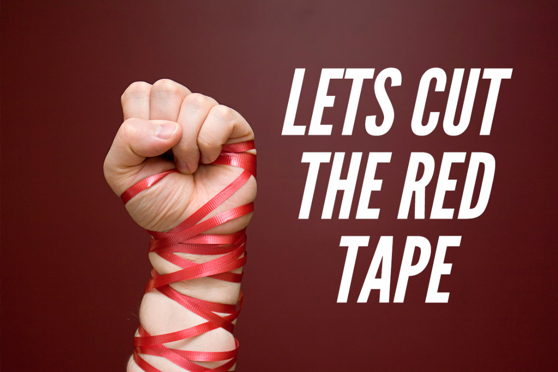 A hand wrapped in red tape