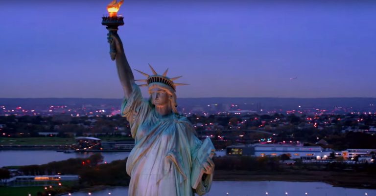 Statue of Liberty with blue sky background