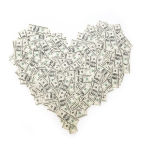 dollar bills in the shape of a heart