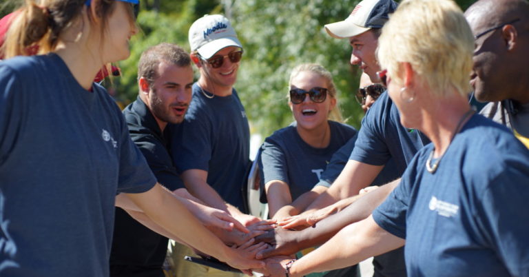 Volunteers all hands in