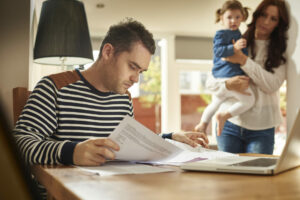 Dad doing paperwork, tax