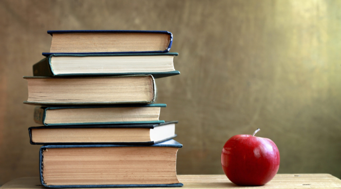 Stack of Books and Apple