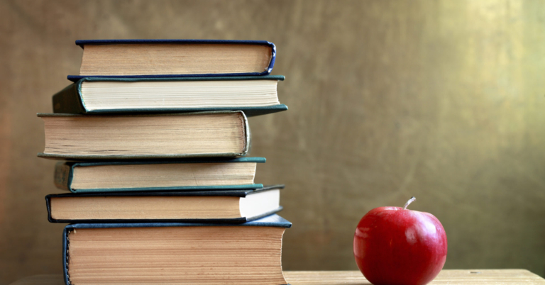 Stack of Books and Apple