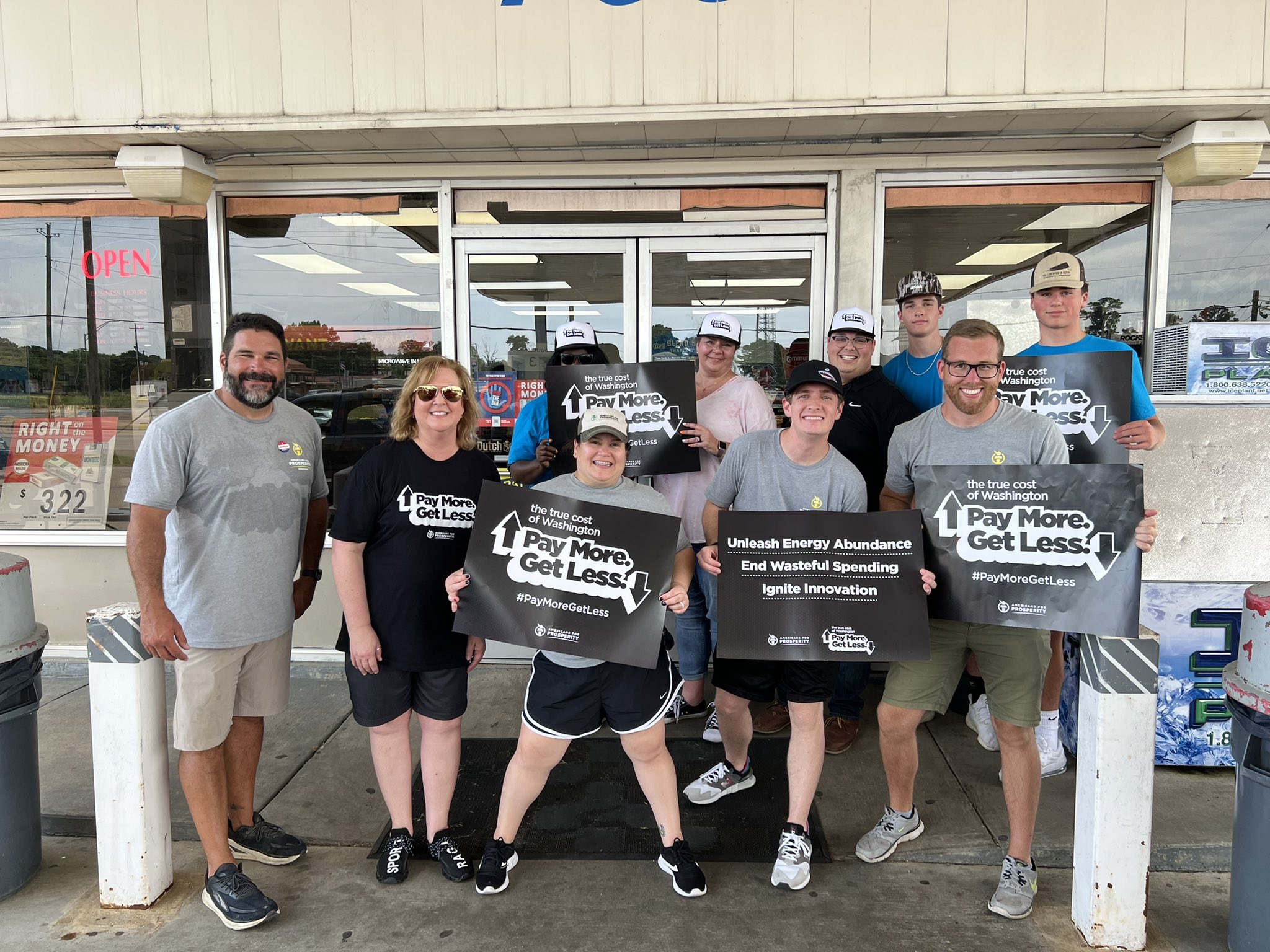 AFP-Mississippi staff pose for a photo outside a local Chevron station, where they helped provide discounted gas as relief from the high cost of gas in 2022.
