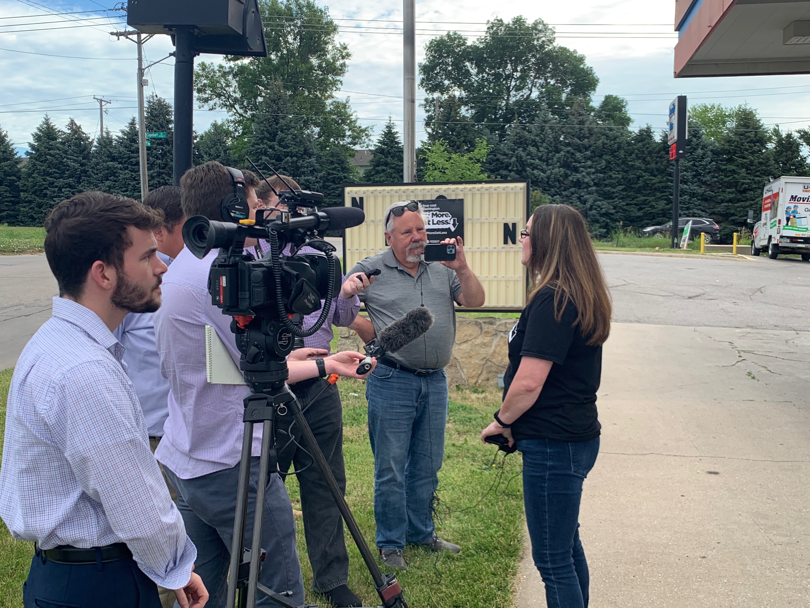 Americans for Prosperity-Nebraska State Director Jessica Shelburn is interviewed by the media at AFP's True Cost Event in Bellevue. The event lowered the cost of gas in 2022 while connecting customers to Washington's failed policies as the cause of historic inflation and rising gas and grocery prices.