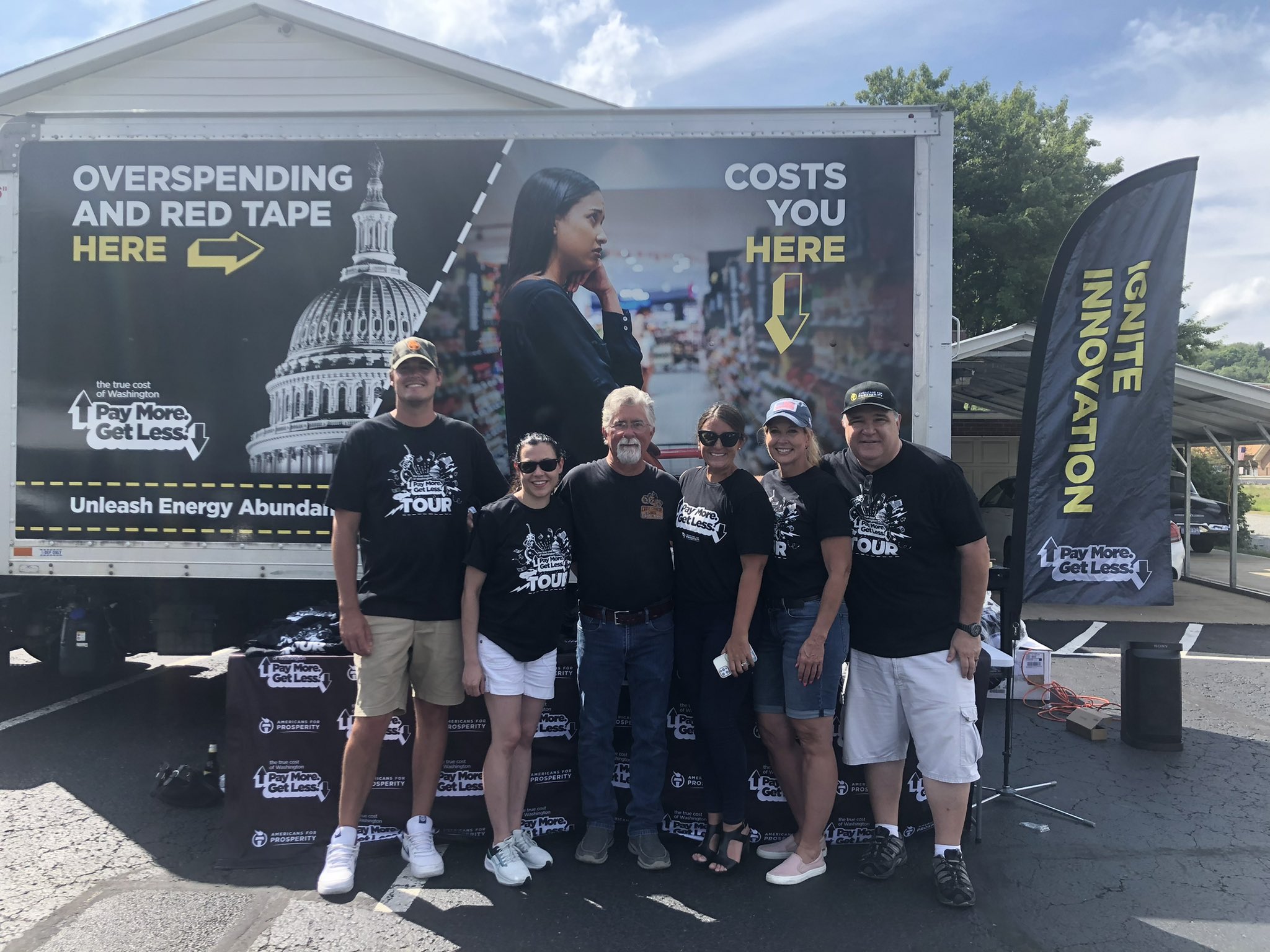 Americans for Prosperity-Pennsylvania activists stand in front of the True Cost of Washington Tour truck, which reads, "They spend trillions here...you pay here." Our activists in PA brought relief to customers struggling with the high cost of gas in 2022.