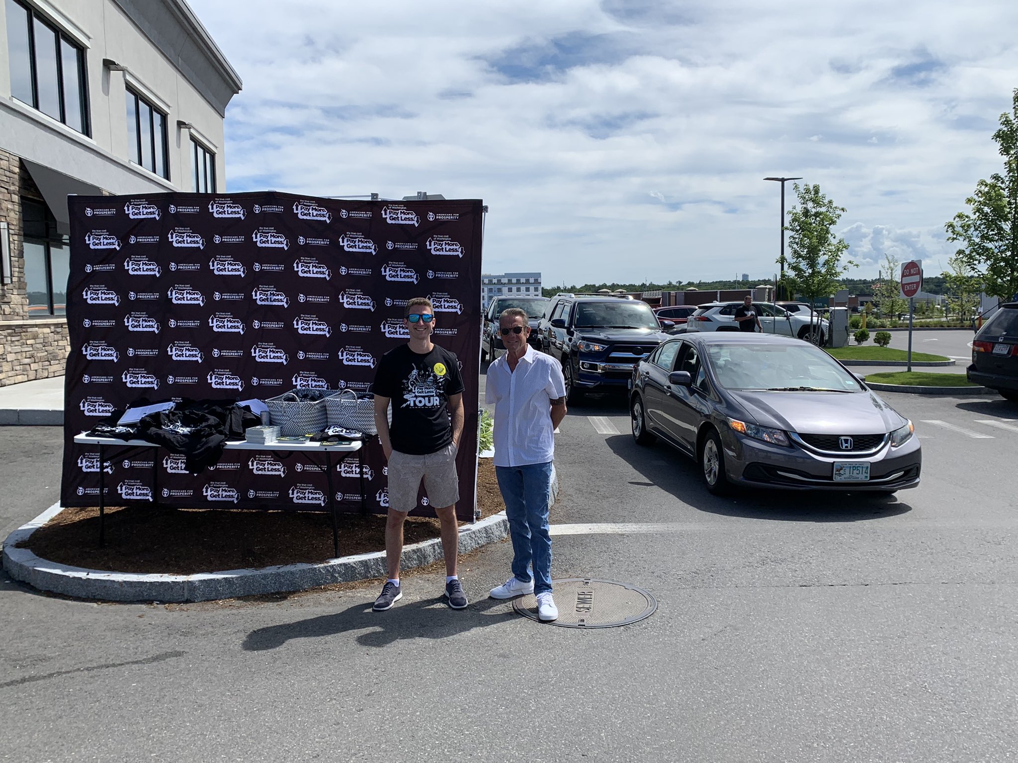 Cars lining up early for relief from the rising cost of gas in 2022. AFP-New Hampshire was on hand to lower gas prices for customers and educate them about how Washington's failed policies are driving the rising cost of gas over time.