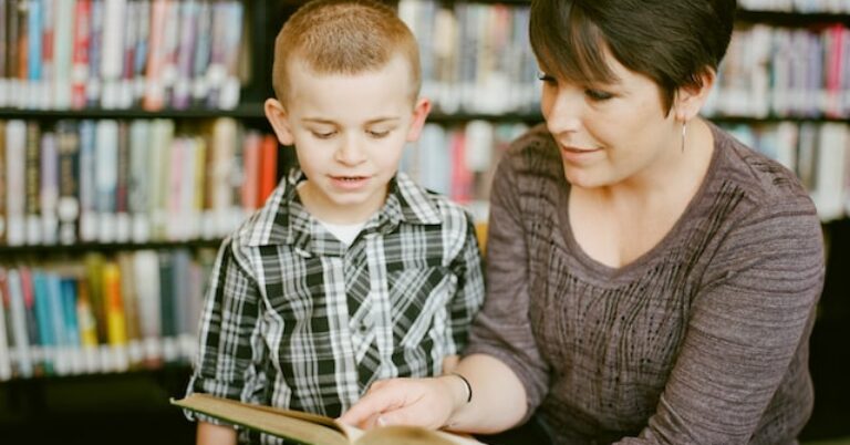 Governor Stitt's executive order bringing Oklahoma into compliance with the Supreme Court's ruling in Janus v. AFSCME strengthens the rights of Oklahoma educators. Here, a teacher reads with a student in the school library.