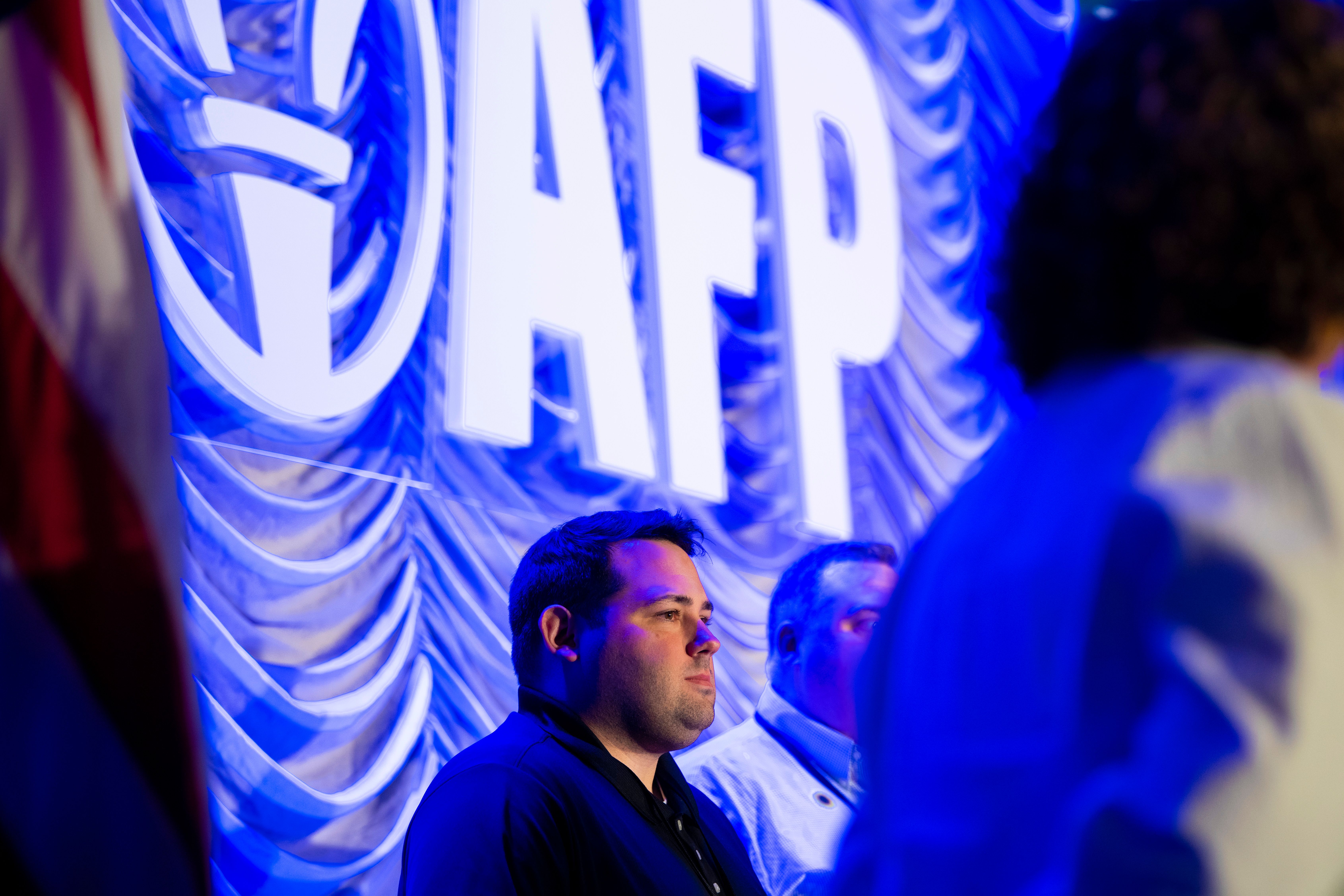 Cobi Bruner, grassroots engagement director for Americans for Prosperity-North Carolina, on stage at AFP's 2023 all-staff conference as a nominee of the George Gibbs 2023 Grassroots Engagement Director of the Year award.