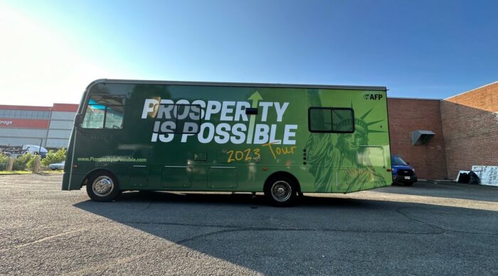 New photos of the Prosperity Is Possible tour bus as it hits the road!