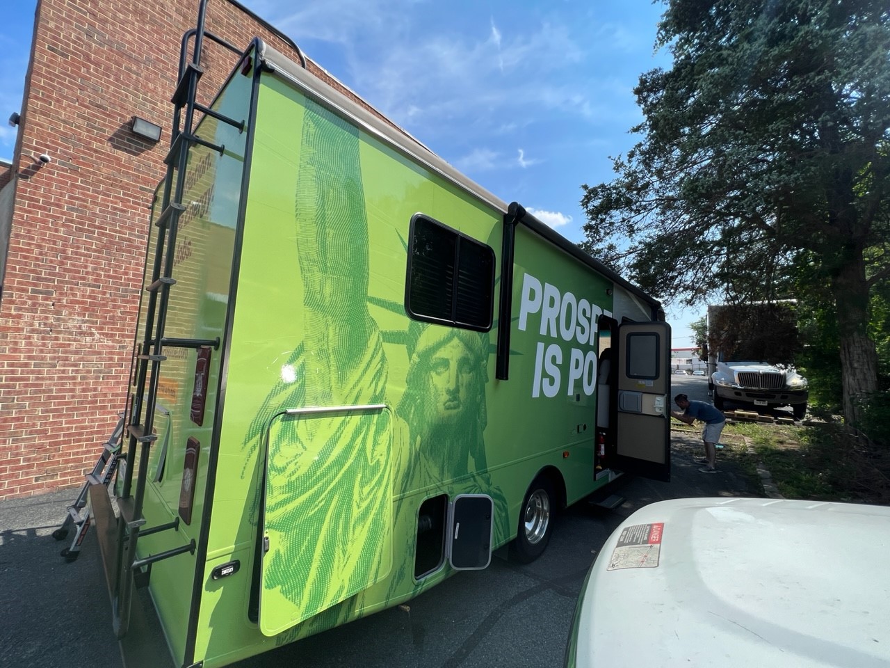New photos of the Prosperity Is Possible tour bus as it hits the road ...